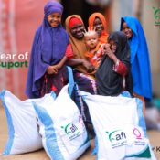 Children with nutrition assistance bags provided through a Kafi for Development initiative.