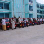 Red tuk-tuks provided through Kafi for Development's youth economic empowerment initiative in Mogadishu.